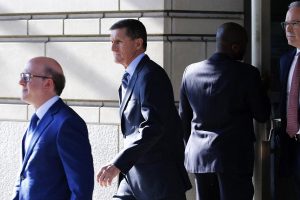 Former U.S. National Security Adviser Michael Flynn (centre)  departs U.S. District Court, where he was expected to plead guilty to lying to the FBI about his contacts with Russia’s ambassador to the United States, in Washington, U.S., December 1, 2017. REUTERS/Jonathan Ernst