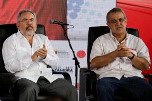 Venezuela’s Oil Minister Nelson Martinez (L) and Eulogio del Pino, president of Venezuelan state oil company PDVSA, attend the swear in ceremony