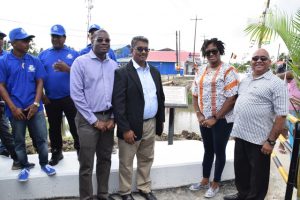 (From left) Minister of Public Infrastructure, David Patterson; CEO, GAICO, Komal Singh; Minister within the Ministry of Public Infrastructure, Annette Ferguson and REO, Region Three, Dennis Jaikaran at the unveiling of the plaque. (DPI photo)