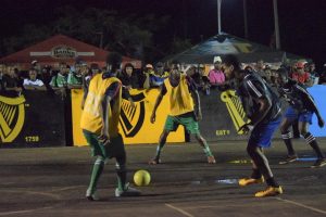 Scenes from the North Ruimveldt (black) and Rising Stars in the round of 16 clash at the National Cultural Center in the Guinness ‘Greatest of the Streets’ Georgetown Championship