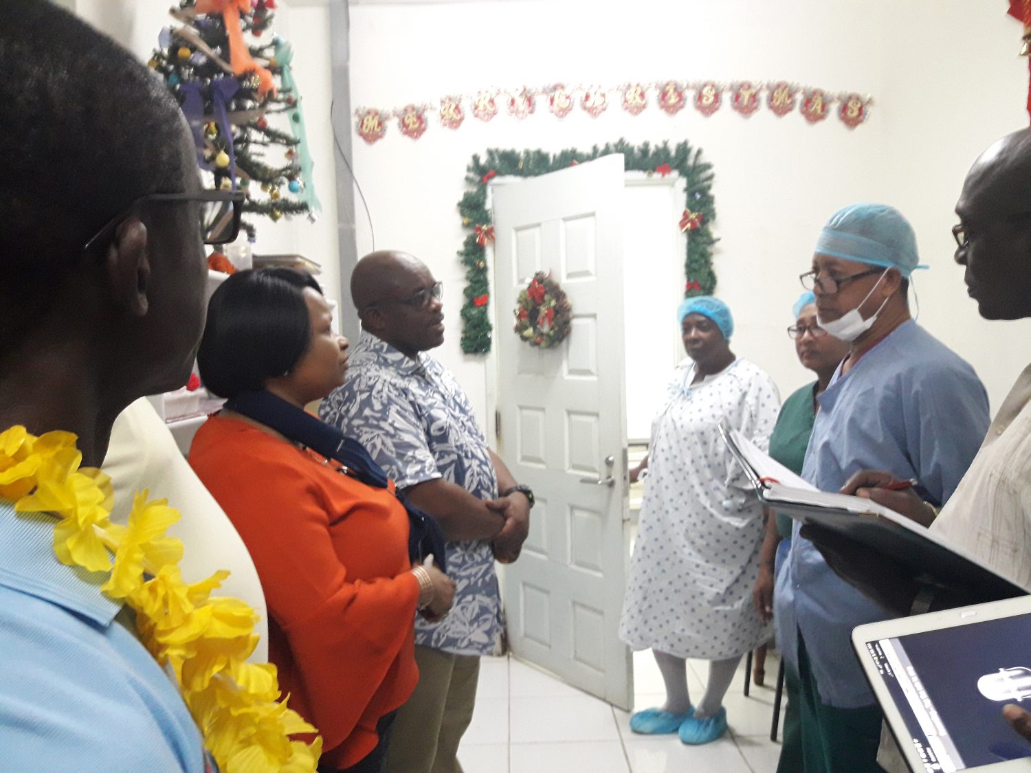 Public Health Minister Volda Lawrence (second from left) during one of the visits.
