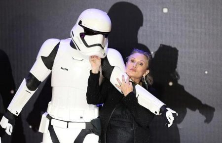 Carrie Fisher poses for cameras as she arrives at the European Premiere of Star Wars, The Force Awakens in Leicester Square, London, on December 16, 2015. REUTERS/Paul Hackett/File Photo