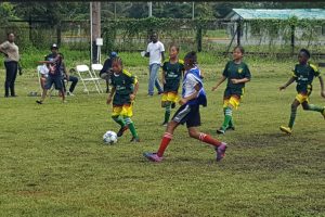 Action on day two in the Smalta Girls U11 football competition yesterday at the Ministry of Education ground, Carifesta Avenue.