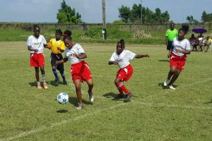Action in the Smalta Girls u11 Football a yesterday at the Ministry of Education ground, Carifesta Avenue.