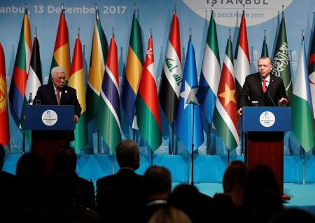 Turkish President Tayyip Erdogan and Palestinian President Mahmoud Abbas attend a news conference following the extraordinary meeting of the Organisation of Islamic Cooperation (OIC) in Istanbul, Turkey, December 13, 2017. REUTERS/Osman Orsal