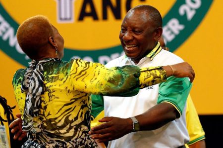 Deputy president of South Africa Cyril Ramaphosa greets an ANC member during the 54th National Conference of the ruling African National Congress (ANC) at the Nasrec Expo Centre in Johannesburg, South Africa December 18, 2017. REUTERS/Siphiwe Sibeko