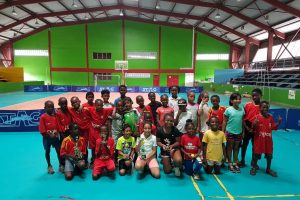 The respective winners display their spoils following the conclusion of the Guyana Lawn Tennis Association, Christmas Interschool RED BALL’ Championship.