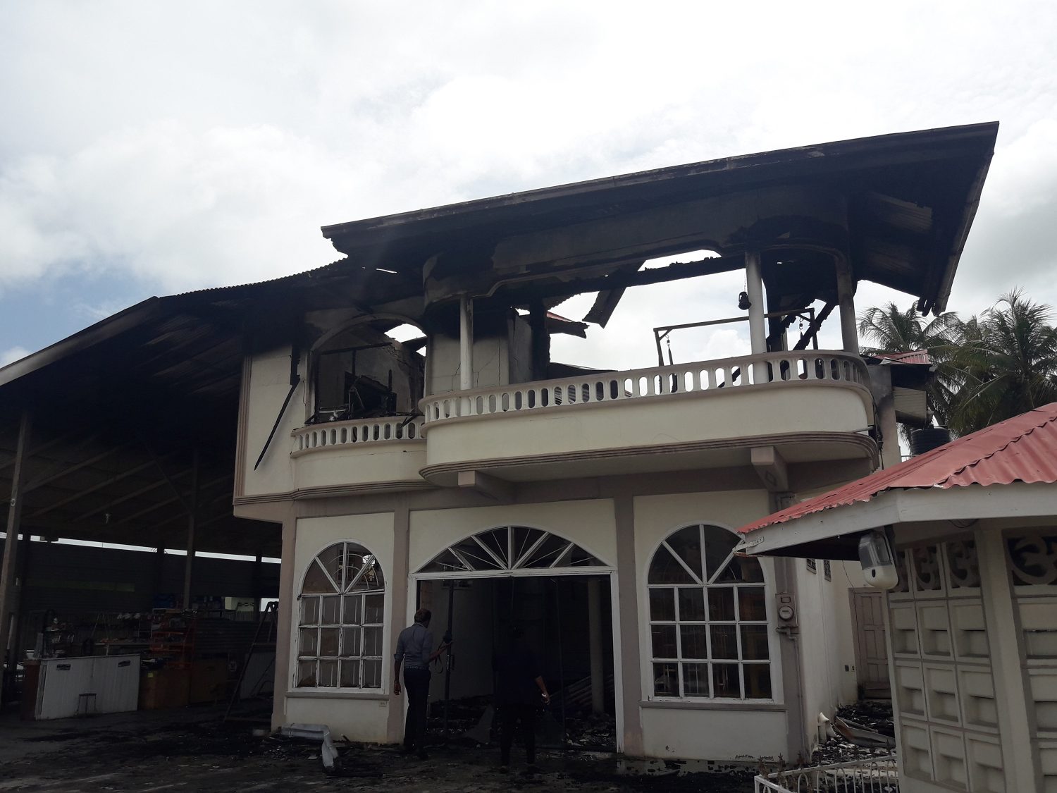 The burnt remains of the property that once housed K Persaud General Store and Auto Sales at Clifton Village, Corentyne