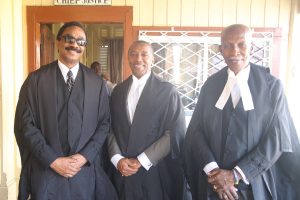 Attorney General Basil Williams SC (left) with Barbadian Queens Counsel Ralph Thorne and Hal Gallop, who were retained to assist in fighting the state’s case (Photo by Keno George)