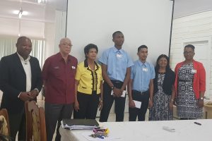 (From left to right) Assistant Chief Education Officer (Technical), Patrick Chinedu Onwugmia; Gafoor Foundation Board members Major-General (rtd), Norman McLean and Sylvia Conway, recipients of the award  Emani Charles and Joshua Bharat, Ameena Gafoor and acting GTI Principal, Renita Crandon Duncan.
