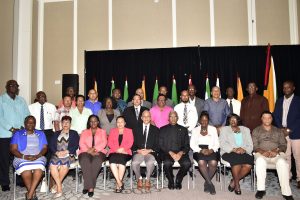 Heads of local government organs who participated at the NRDCC meeting along with President David Granger (seated fourth, from right), who is flanked by Minister of Communities Ronald Bulkan and Minister within the Ministry of Communities Valerie Patterson-Yearwood. Minister of Public Affairs Dawn Hastings-Williams is seated at fourth from left. (Ministry of the Presidency photo) 