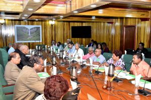 Following criticism over government’s handling of the restructuring of GuySuCo, President David Granger and members of his Cabinet (at left) met yesterday with the leadership of sugar workers’ unions GAWU and NAACIE (at right) to discuss the future of the industry (Ministry of the Presidency photo)
