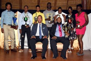 The recipients of the AAG’s award ceremony posing with their spoils on Saturday night at the Umana Yana in Kingston. (Orlando Charles photo)
