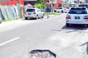 Fix me: Another pothole on Camp Street crying out for repairs.