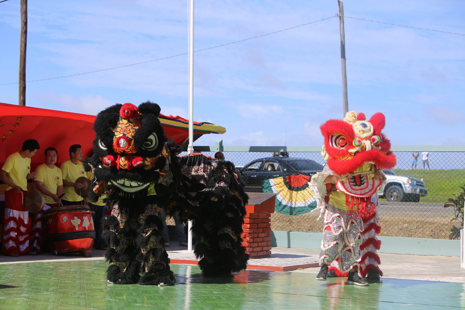 A performance of the Chinese Lion Dance yesterday at the Windsor Forest Primary School, where the 165th anniversary of the arrival of Chinese Indentured Immigrants in Guyana was commemorated. (Photo by Keno George)