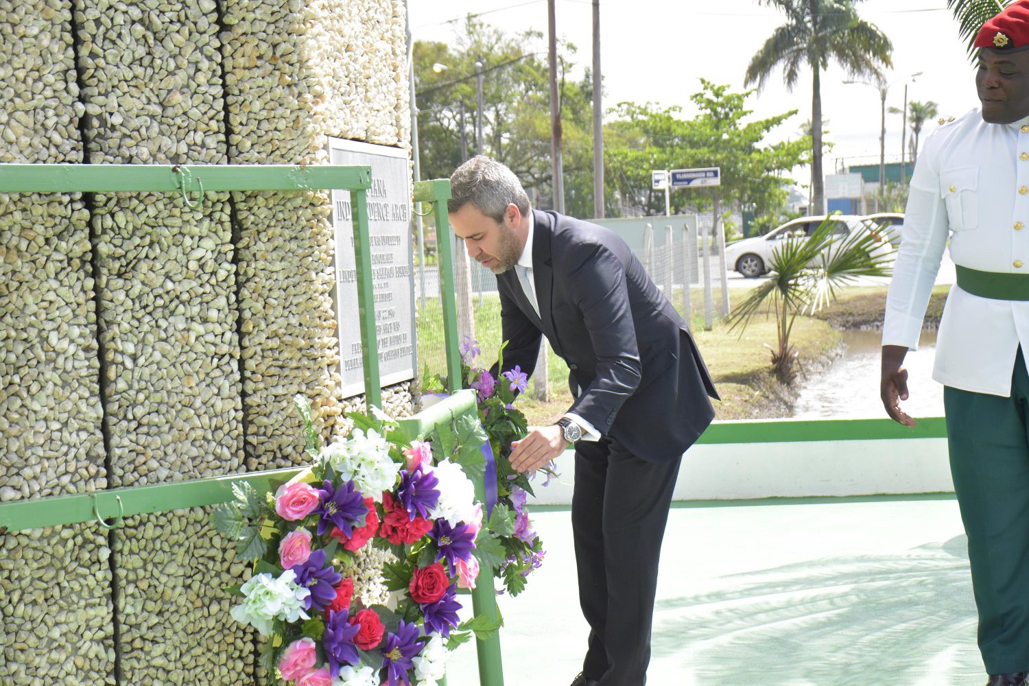 Non-Resident High Commissioner of the Republic of Cyprus to Guyana, Haralambos Kafkarides laying a wreath at the Independence Arch on Brickdam. (Ministry of the Presidency photo)