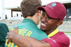 West Indies Under-19s captain Emmanuel Stewart (right) embraces his opposite number Raynard van Tonder following the defeat to South Africa Under-19s.