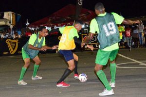 Flashback- Trevon Lythcott (centre) of ESPN, trying to maintain possession against Kacy John (left) and Domini Garnett of Agricola Champion Boys, during their quarterfinal clash in the 2017 edition of the Guinness ‘Greatest of the Streets’ West Demerara/East Bank Demerara zone.