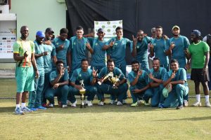 The Georgetown players are all smiles after they won the Guyana Cricket Board/Jaguars limited overs franchise tournament yesterday at the Providence National Centre.
