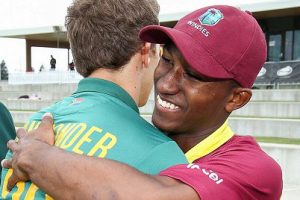  West Indies Under-19s captain Emmanuel Stewart (right) embraces his opposite number Raynard van Tonder following the defeat to South Africa Under-19s. 
