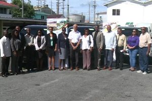 Minister of Communities Ronald Bulkan (seventh from right) and representatives of  the Bartica, Mabaruma and Lethem municipalities along with other government officials. (DPI photo)