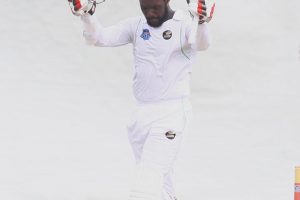 Raymon Reifer expresses relief after reaching his maiden first-class century yesterday (Orlando Charles photo)