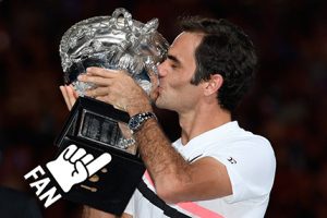 Roger Federer with Grand Slam trophy number 20.