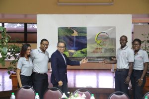 From left are Conference Sponsorship Liaison Officer Mariesa Jagnanan, Conference Chair Cecil Maxwell, District Governor Waddy Sowma, District Rotaract Representative– Elect Delon Earle and Public Relations Officer Julene Barrett, unveiling the logo for this year’s conference last Friday 