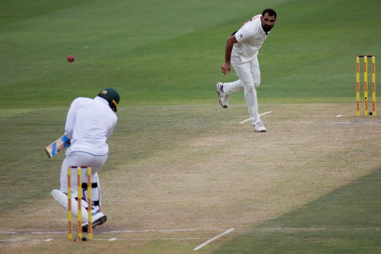 South Africa’s Andile Phehlukwayo avoids a bouncer from Mohammed Shami (REUTERS/James Oatway)