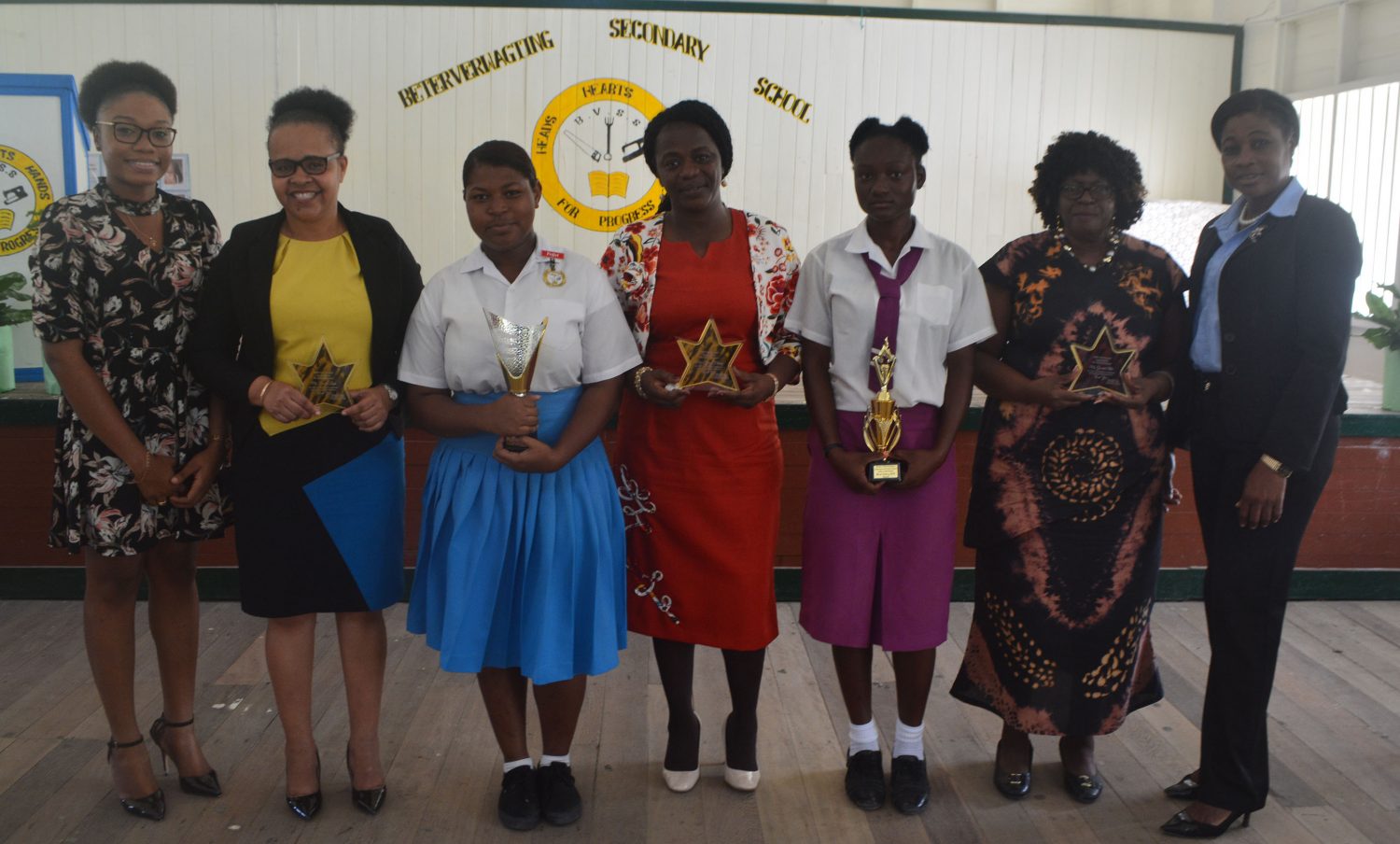 Those honoured at Region Four’s Black History Month event. From left are: CARICOM IKEMBA representative Onika Frank; Regional Executive Officer Pauline Lucas; Beterverwagting student Danelle Goddette; Regional Education Officer Tiffany Favourite-Harvey; La Bonne Intention student Shenelle Harris; Regional Chairperson Genevieve Allen; and Director of Youth Gillian Frank.
