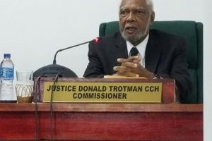 Justice (retired) Donald Trotman speaking this morning.
