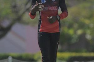 Left-arm spinner Khary Pierre prepares to send down another delivery during his six-wicket haul. (Photo courtesy CWI Media) 