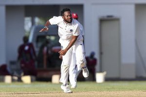 Left-arm spinner Jomel Warrican sends down a delivery during his seven-wicket haul on Tuesday. (Photo courtesy CWI Media) 