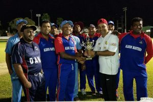 Albion skipper Rajin Moonsammy (left) and the other members of the team, receive the winning prize from GFSCA’s Rakesh Arjune.