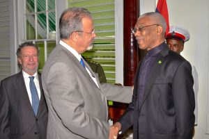 President David Granger (right) greeting Brazil's Minister of Defence, Raul Jungmann. He later introduced him to members of Cabinet and the Defence Board. (Ministry of the Presidency photo)