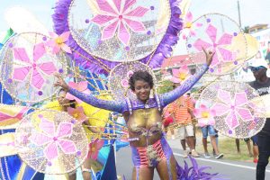 Leading the way: One of the queen’s of the GTT Pulse Mash Band, titled “Amazon Gems,” which was among the standouts during the annual Mashramani costume and float parade yesterday. See centre pages for more parade scenes. (Photo by Keno George)   