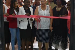 Chairperson of GWI and Mayor of Georgetown, Patricia Chase-Green (centre) cutting the ribbon to officially open the office at Parika. (GWI photo)