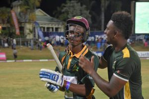 Alick Athanaze (left) is congratulated by Roland Cato after taking Volcanoes to a sensational win in the Regional Super50 final. (Photo courtesy CWI Media) 