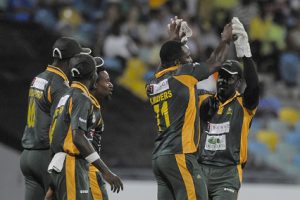 All-rounder Kyle Mayers (second from right) celebrates another wicket with his teammates during Volcanoes win. (Photo courtesy CWI Media) 