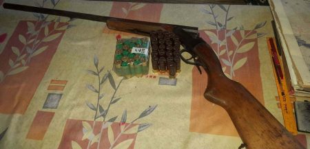 The shotgun and live cartridges found and seized by police.  (Guyana Police Force photo)