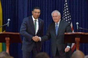(Jamaica Observer) Prime Minister Andrew Holness (left) and United States Secretary of State, Rex Tillerson, shake hands following a joint press conference at the Office of the Prime Minister yesterday). Tillerson was on a one-day working visit to Jamaica.