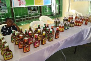 SS Natural Flavour BBQ Sauce, along with hot sauce and other products on display at the mini expo set up for the launch of UncappeD Marketplace yesterday outside of the Guyana Marketing Corporation on Robb Street.