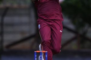 Seamer Carlos Brathwaite prepares to send down a delivery during his five-wicket haul against PNG on Thursday. (Photo courtesy ICC) 