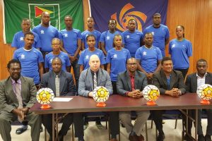 The Guyana Football Federation (GFF) officially launched their CONCACAF D-License programme yesterday at the Guyana Olympic House, Liliendaal. The aim of the four day seminar, which will be attended by 13 coaches, is to build capacity amongst the local technical personnel. Technical Director Ian Greenwood, Bryan Joseph and Sampson Gilbert will also be certified as D-License Instructors.
In the photo the participating coaches are standing at rear. Seated from left to right: Sampson Gilbert, Bryan Joseph, GFF Technical Director Ian Greenwood, GFF President Wayne Forde, CONCACAF Instructor Anton Corneal, CONCACAF Manager of Development Caribbean Andre Waugh.