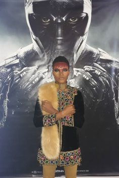 Model and make-up artist Clinton Duncan in a show stopping assemble for his first viewing of Black Panther.
