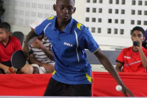 Jamal Nicholas in action during his quarterfinal clash with Isiah Layne in the Scotia Bank Boys Under – 18 Division of the Scotia Bank Table Tennis tournament yesterday at Queen’s College ( Royston Alkins photo) 
