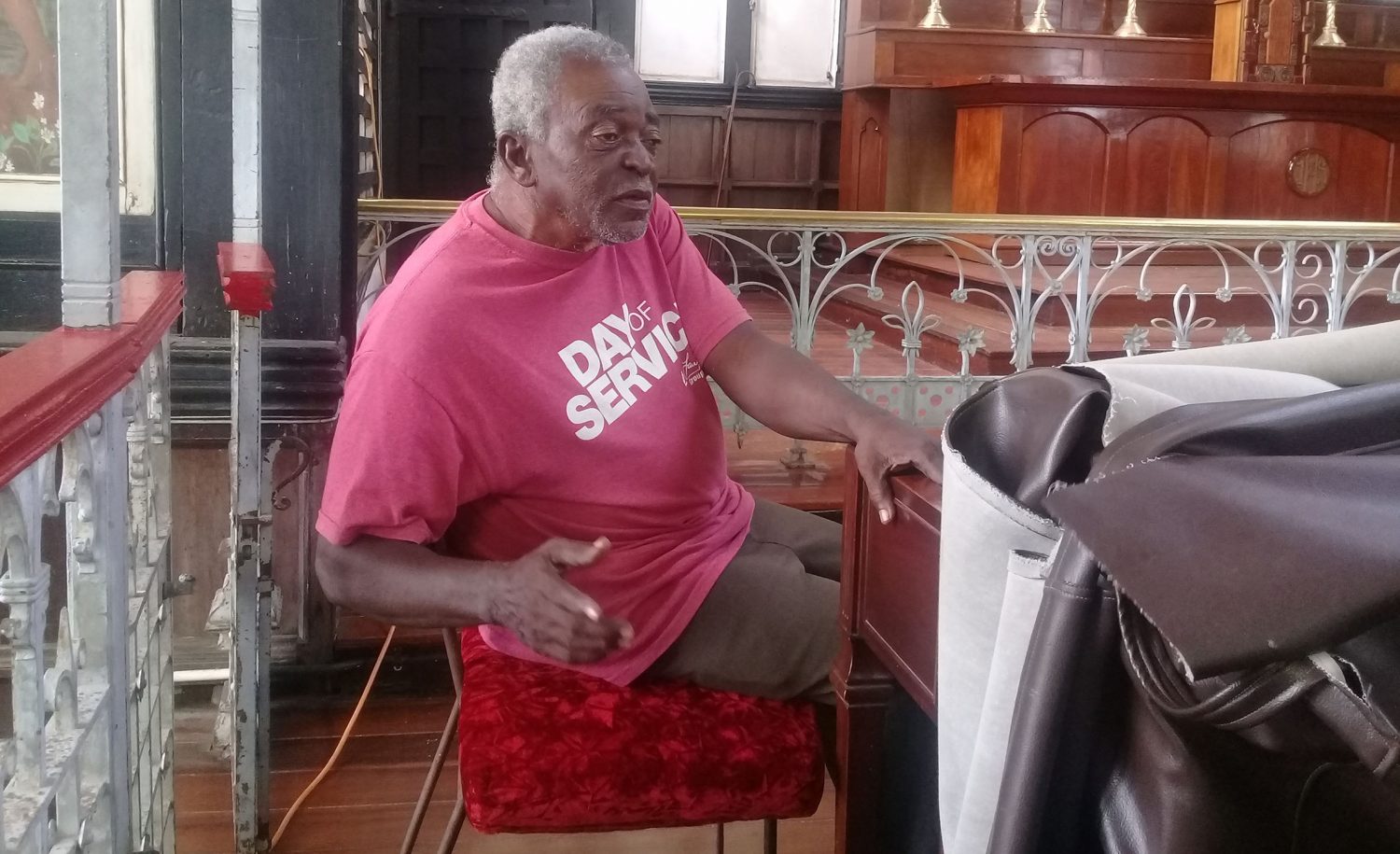 Laurie Greenidge seated beside the piano in the St George’s Cathedral during the interview.
