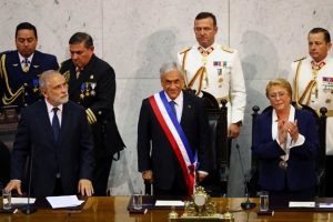 Chile’s newly sworn in President Sebastian Pinera (centre) stands next to President of the Senate Carlos Montes (left) and former president Michelle Bachelet at the Congress in Valparaiso, Chile, March 11.  (Reuters/Ivan Alvarado)