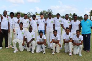 The victorious Demerara U17 side with coach Orin Bailey (left) and manager Rohan Sarjoo, the former national U19 player (right) (Royston Alkins Photo) 