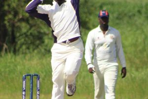  GNIC’s skipper Ovid Richardson raises his bat after reaching racing to fifty in his side’s second innings run chase (Royston Alkins photo)